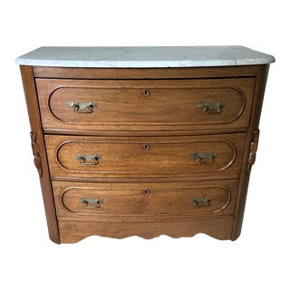 Early 20th Century Antique Victorian Marble Top Walnut Dresser With Carved Detailing For Sale