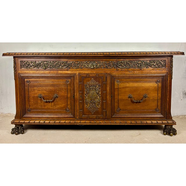 Impressive large oak sideboard in the Henry II and Renaissance Revival style, dating to the early 20th century. The piece...