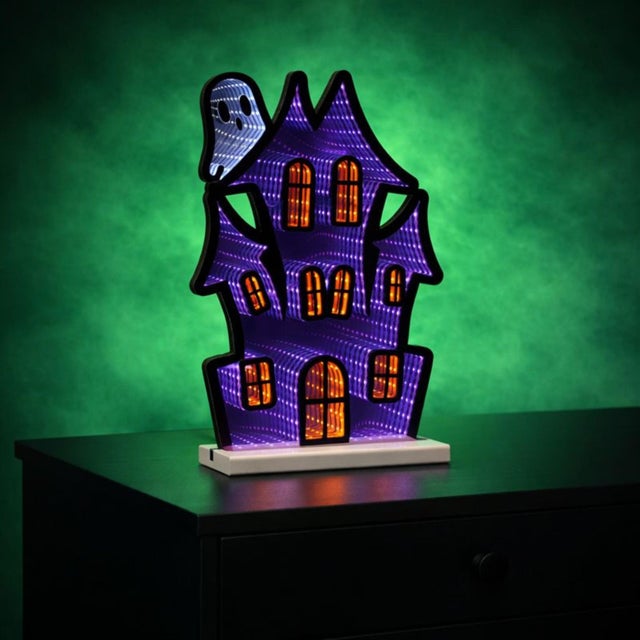 Set the perfect spooky scene this Halloween with the Haunted House with Ghost Ekkolight. This eerie yet enchanting piece...