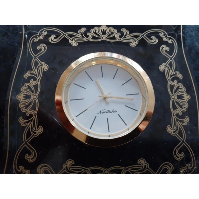 This is an EXQUISITE Noritake Quartz Desk Clock in 4" Lucite Holder. Chairish sells clocks solely to be intended for...