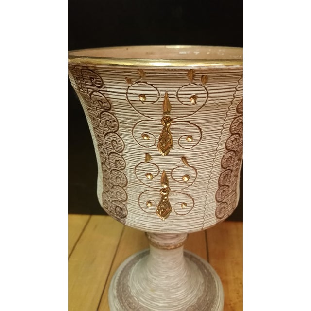 Here's a lovely piece of Italian pottery created by Fratelli Fanciullacci in the Mid Century period. It features sgraffito...