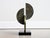 Vintage table top sculpture crafted in solid bronze affixed to a black lucite base. Body of sculpture features three...