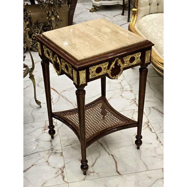 In love with the design. Beautiful side table with gold details. This table can be used for decoration in the hallway or...