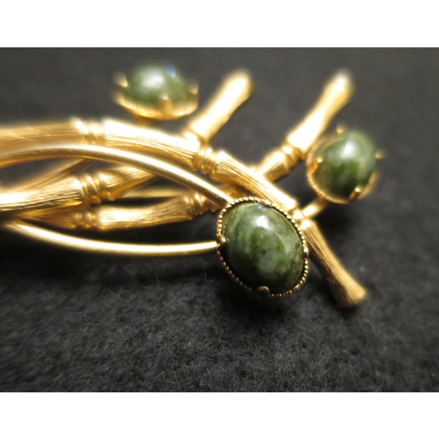 Beautifully designed, this Asian-inspired 1950s Winard Bamboo Jade Brooch / Pin will be a lovely addition to any vintage...
