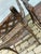 Pair of Regency Style Faux-Bamboo Faux-Painted Caned Seat Arm Chairs by Baker Furniture. For Sale - Image 10 of 12
