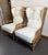 Pair of bamboo armchairs complete with polyurethane cushions and synthetic padding, the covering in pure heavy linen with...
