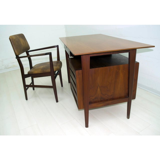 This teak desk with a chair was designed by the famous Italian designer Vittorio Dassi in Italy in the 50s. This piece is...