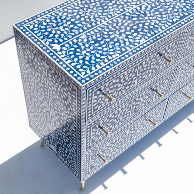 The Arabesque Bone Inlay Six-Drawer Dresser explores the elegance of classical botanical ornamentation through a striking...