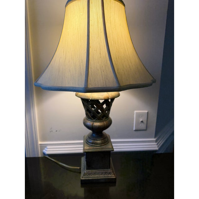 "The Body: Features a heavy, substantial cast-metal column neck and pedestal base designed with an antique, hand-...