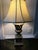 "The Body: Features a heavy, substantial cast-metal column neck and pedestal base designed with an antique, hand-...