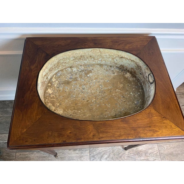 A very nice early 20th century French Walnut Louis XV1 style Jardinière table with the original Zinc tub insert. This...