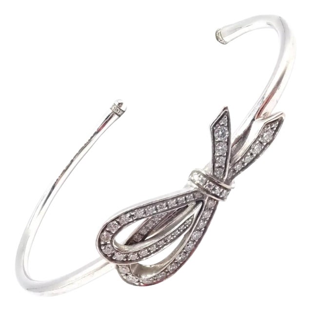 Late 20th Century Tiffany & Co. White Gold Diamond Bow Ribbon Bangle Cuff Bracelet For Sale