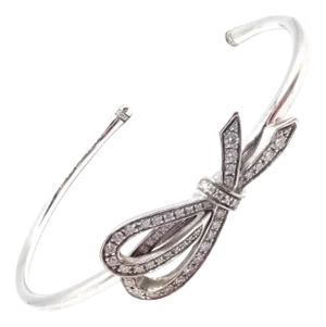Late 20th Century Tiffany & Co. White Gold Diamond Bow Ribbon Bangle Cuff Bracelet