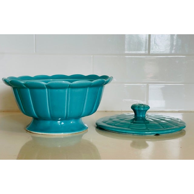 Beautiful mid-century modern turquoise ceramic bowl with lid. This piece is both lovely and practical. It has a nice...
