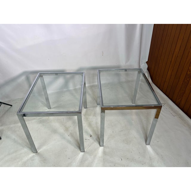 For sale is this nice simple set of chrome side tables with glass tops.