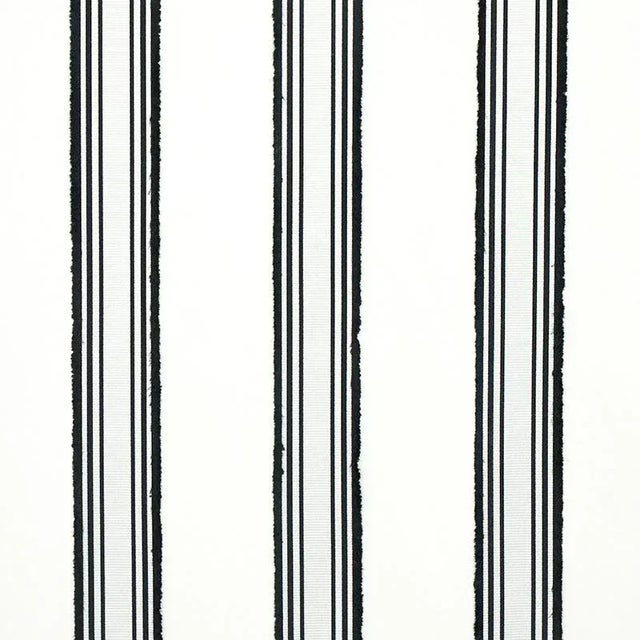 This classic satin stripe features fringed edges for an extra layer of richness and a gorgeously restrained sense of...