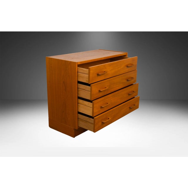 An elegant Mid-Century Modern small chest of drawers. This is a beautiful example of Mid-Century craftsmanship. This...