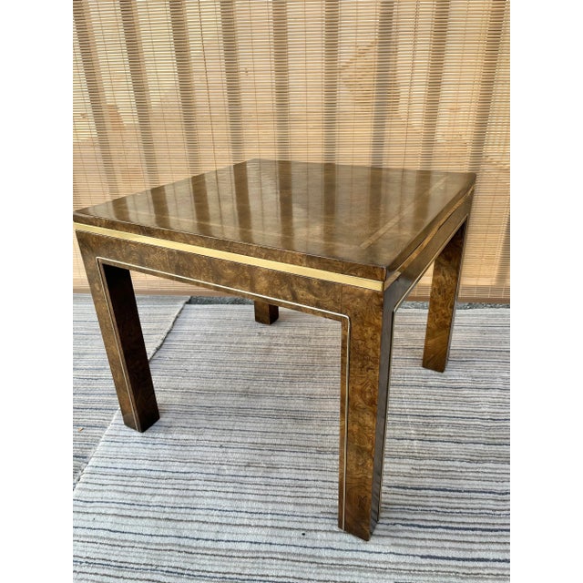 Vintage Mid-Century Burl Side Table by Mastercraft Furniture. Circa 1960s . Features a medium size square shape with a...