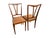 These modern Italian chairs are very light, yet sturdy. The seat features a nailhead design around the perimeter.