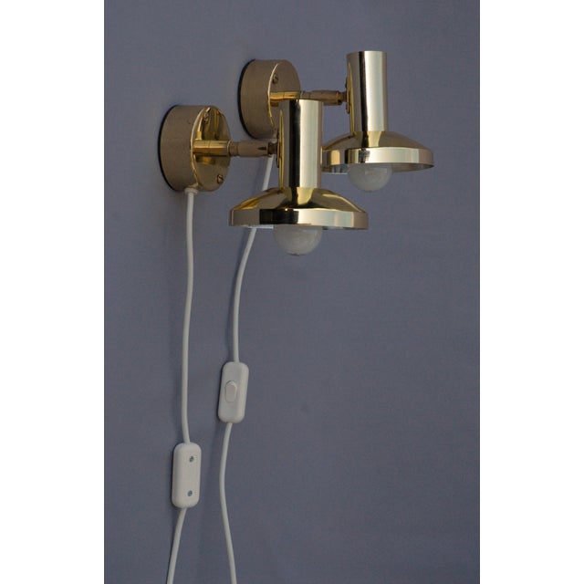 A rare pair of model 295l adjustable wall lamps, designed by hans-agne jakobsson and produced by lilux belysning ab,...