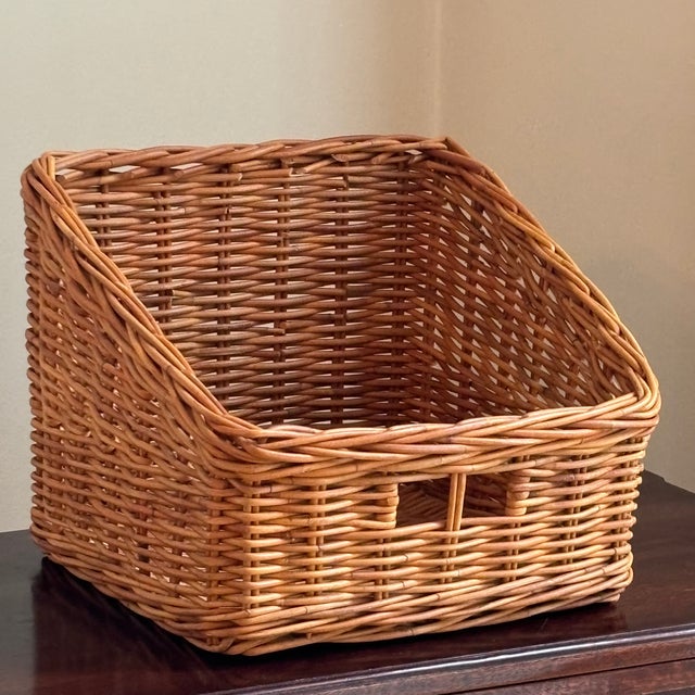 Offering a lovely late-20th century, French-style storage basket. This beautiful, handwoven basket is tapered back-to-...
