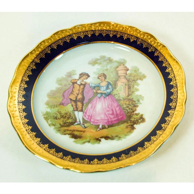 Vintage limoges France fine porcelain round decorative blue and gold. Elegant fine porcelain decorative plate hand painted...