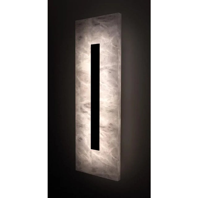 Himeji Medium Shiny Black Applique by Alabastro Italiano Dimensions: Ø 20 x H 60 cm. Materials: White alabaster, leather...