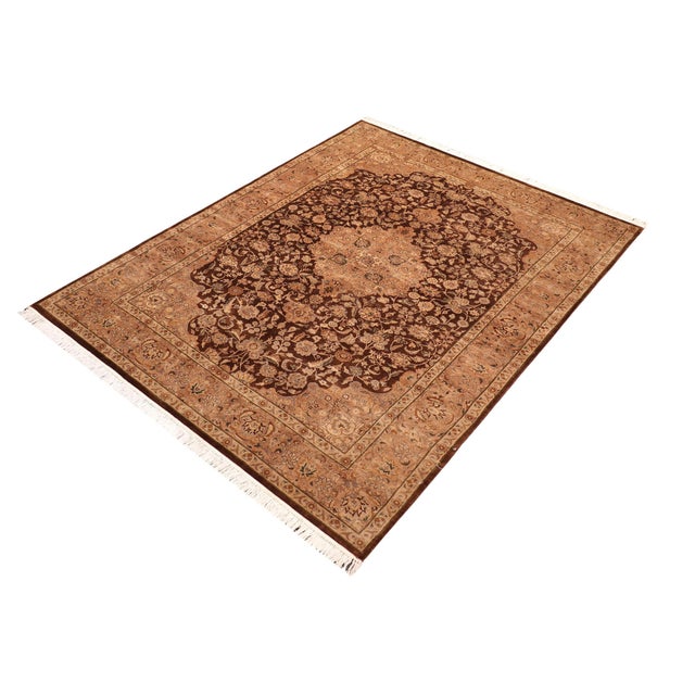 Designed with mesmerizing intricacy and gorgeous color palette, this hand-knotted masterpiece demonstrates the beauty and...