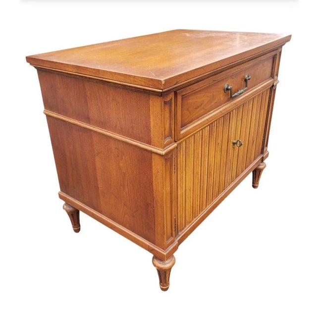 Rare pair of Henredon Custom Folio One Fruitwood bedside tables in very good vintage condition. Features one top drawers a...