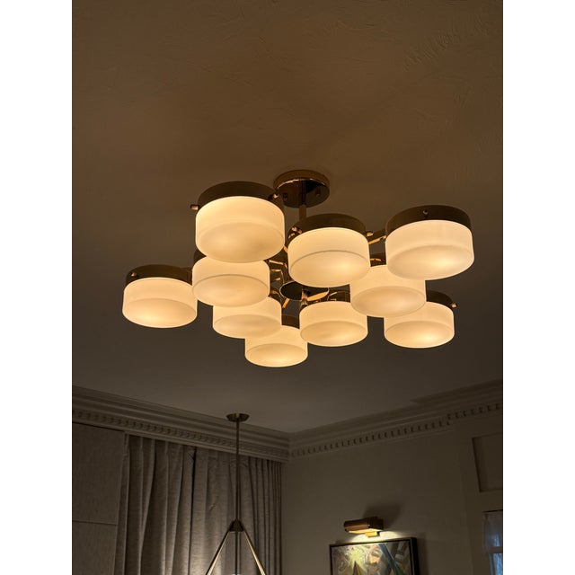 Gio ponti inspired 10 light fixture. High shine brass finish. Purchased new for $1,000, 7 years ago. Very good condition....