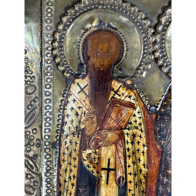 Unique object of Orthodox culture. It is represented by full-length, frontal images of three saints in vestments – Basil...