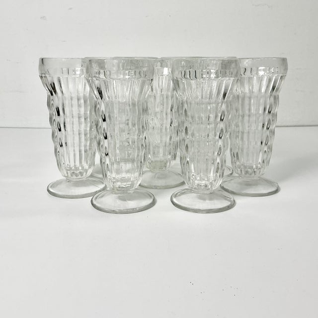 A fun little set of 9 ribbed pressed glass Parfait Cups from the 1940s. These are great to have in your kitchen. They have...