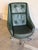 This lounge chair features a high-back contoured shell design with a smooth swivel mechanism. Vintage Danish Mid-Century...