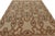 Hand-knotted in wool, this 8x11 European rug in beige features Trellises with floral patterns within in green and red...