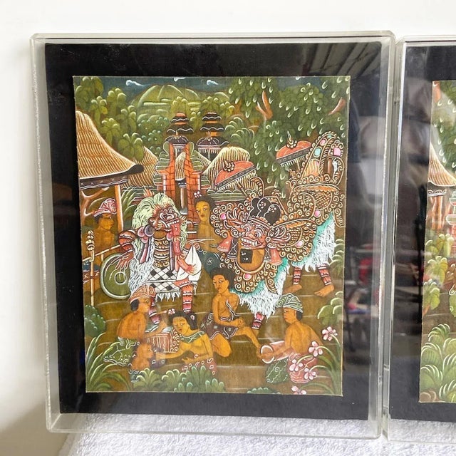 This captivating set of three vintage Balinese paintings showcases the rich cultural traditions and vibrant scenes of...