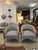Pair of gorgeous custom Italian solid polished stainless steel and curved teak wood club or tub chairs designed and...