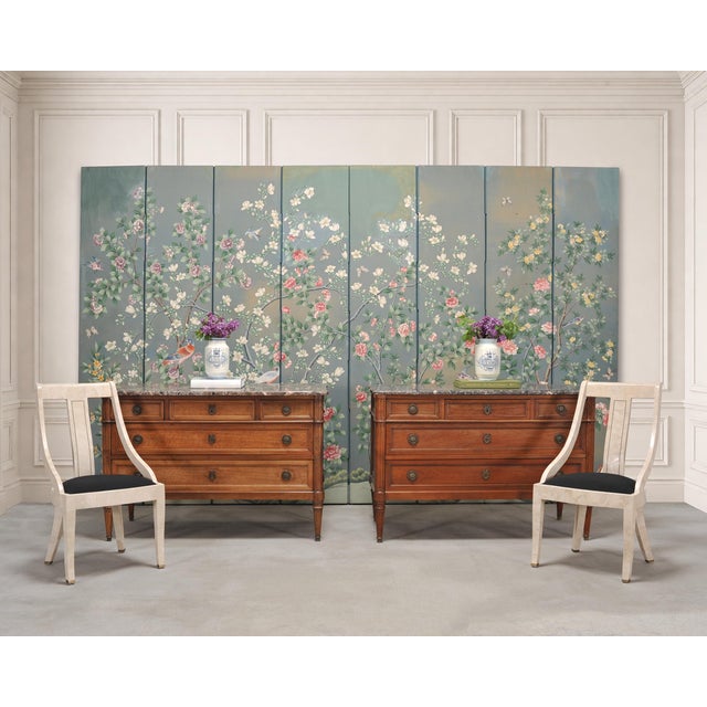 A rare an opulent pair of matched and signed French Louis XVI style commodes, dressers, or chests of drawers by French...