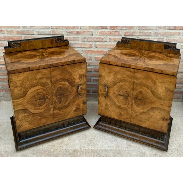 This pair of circa 1930s French art deco side cabinets could be used to flank a sofa or as nightstands. Each has a storage...