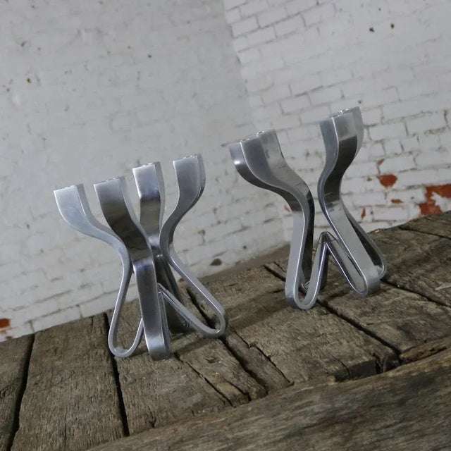 Handsome pair of die-cast zinc candelabra entitled Chorus designed by Karim Rashid for Umbra. The pair are in fabulous...