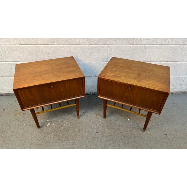 Add a touch of timeless mid-century style to your bedroom with this handsome pair of vintage nightstands by Furnette...