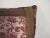 A pillow made from a Fortuny fabric in the iconic Caravaggio pattern, embellished with antique metallic trim and backed...