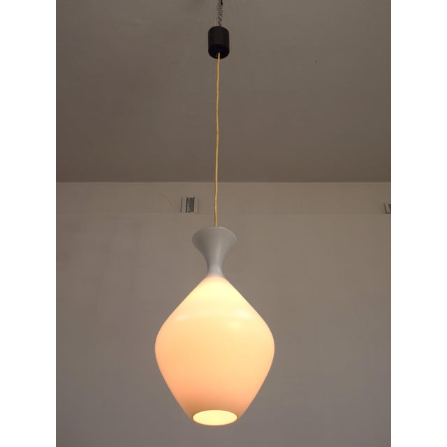 Pendant lamp in white layered glass, italian production from around the 1960s. excellent condition, no breaks, some signs...