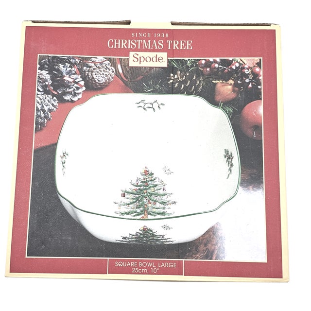 Two ceramic bowls, squared at the edges, adorned with a tree rooted in festivity. One generous, meant for fruits or...