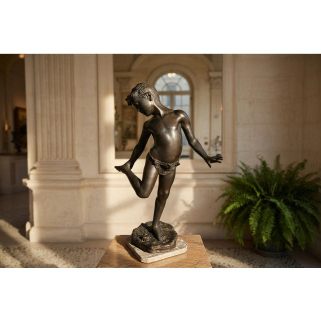 A magnificent dark-patina bronze sculpture, inspired by the celebrated Neapolitan sculptural tradition of the late 19th...