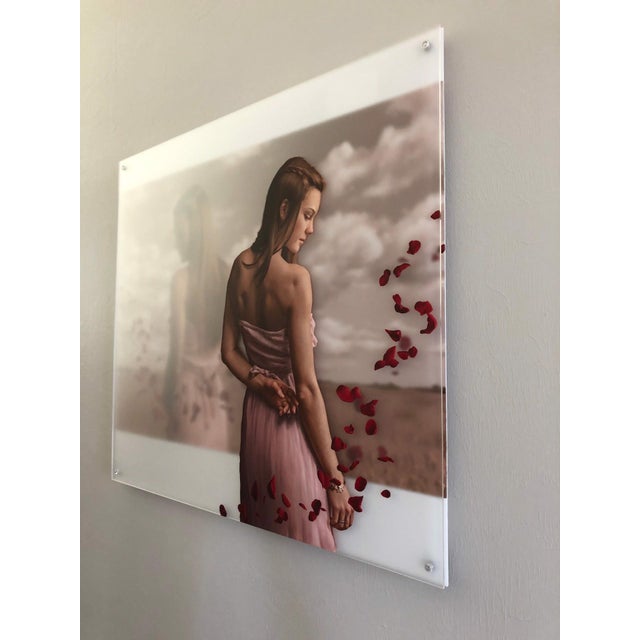Duality explores the complex interplay between two figures depicted on translucent acrylic panels, creating a layered...
