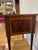 Elegant and versatile, this vintage Maitland-Smith library table features a rich wood finish, leather inset top, and two...