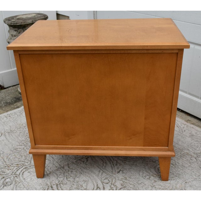 Vintage (1980's) Nightstand has a Contemporay Style. Made by Ethan Allen. The Wood is Maple. The Measurements: 25.5"W x...