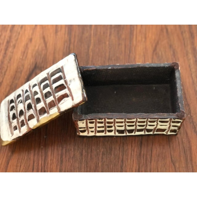 Handmade ceramic box has brass Kintsugi repair. 1960ish. Green felt on bottom.