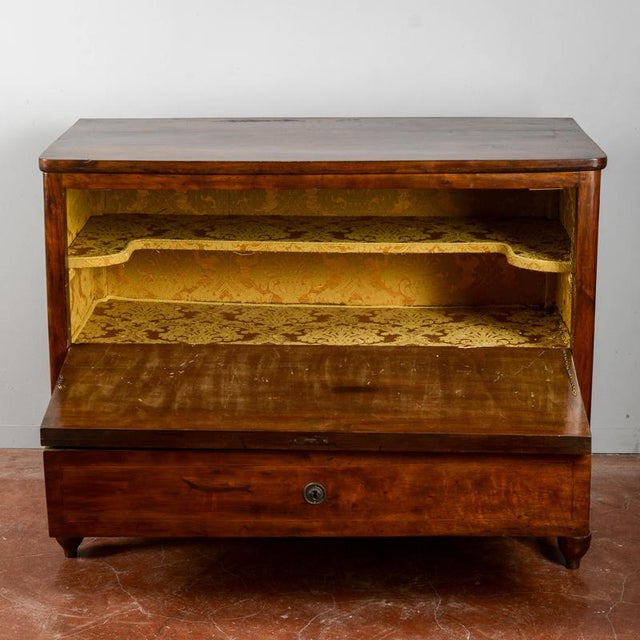 This refined vintage dresser, expertly modified with a drop-leaf door, is an excellent example of functional modernism. It...