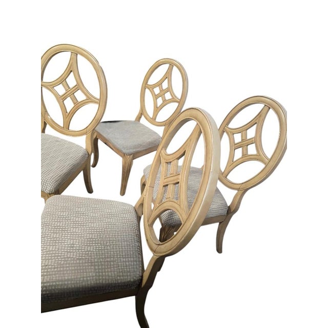 Bring timeless elegance to your dining space with this stunning set of 4 vintage dining chairs. Featuring oval backs with...